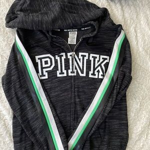 Victoria Secret Pink zip up hoodie size large has leather stripes on sleeves